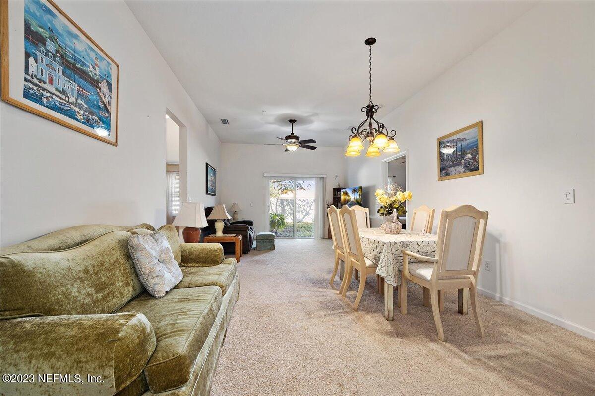 605 Golden Lake Loop St. Augustine, FL 32084 - Photo 4 of 20 a dining room with furniture and window