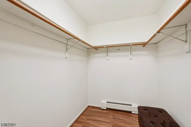 a view of room with racks on the wall