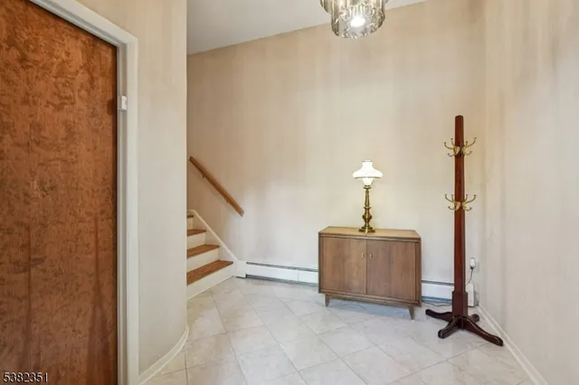 a view of a hallway with staircase