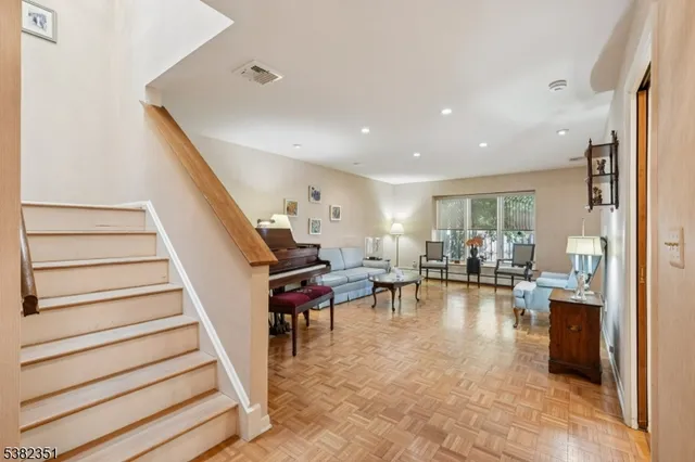 a view of a living room and dining room