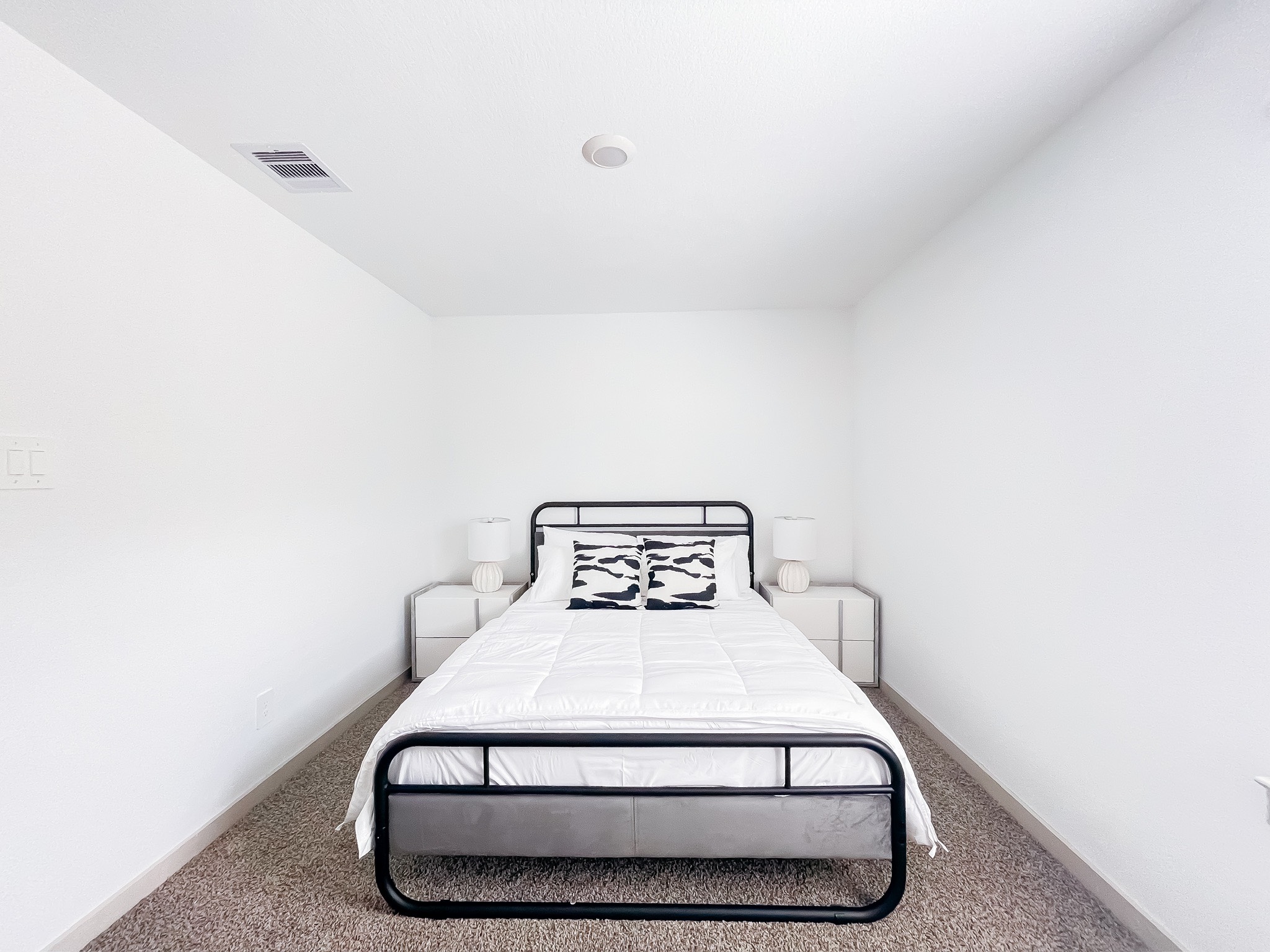 29830 Wildcat Way Katy, TX 77494 - Photo 13 of 17 a bed sitting in a bedroom next to a white wall