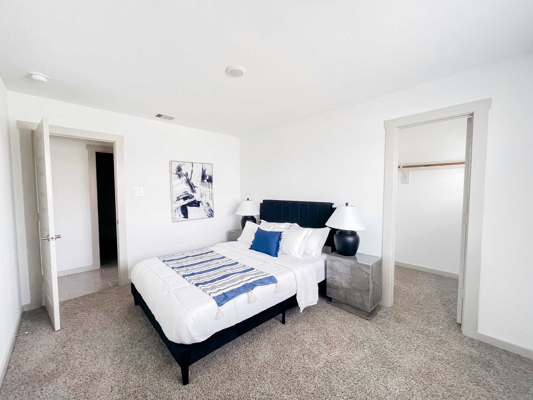 29830 Wildcat Way Katy, TX 77494 - Photo 14 of 17 a bedroom with a bed and a lamp