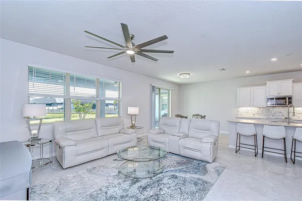 a view of hallway with livingroom
