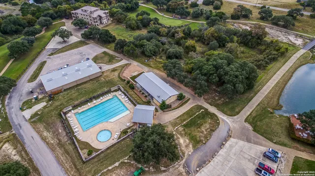 an aerial view of a house with a garden