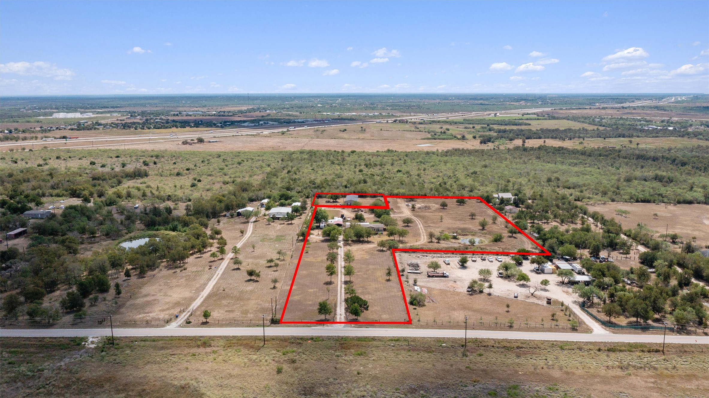 13111 Elm Grove Road Buda, TX 78610 - Photo 1 of 39 full aerial of the property