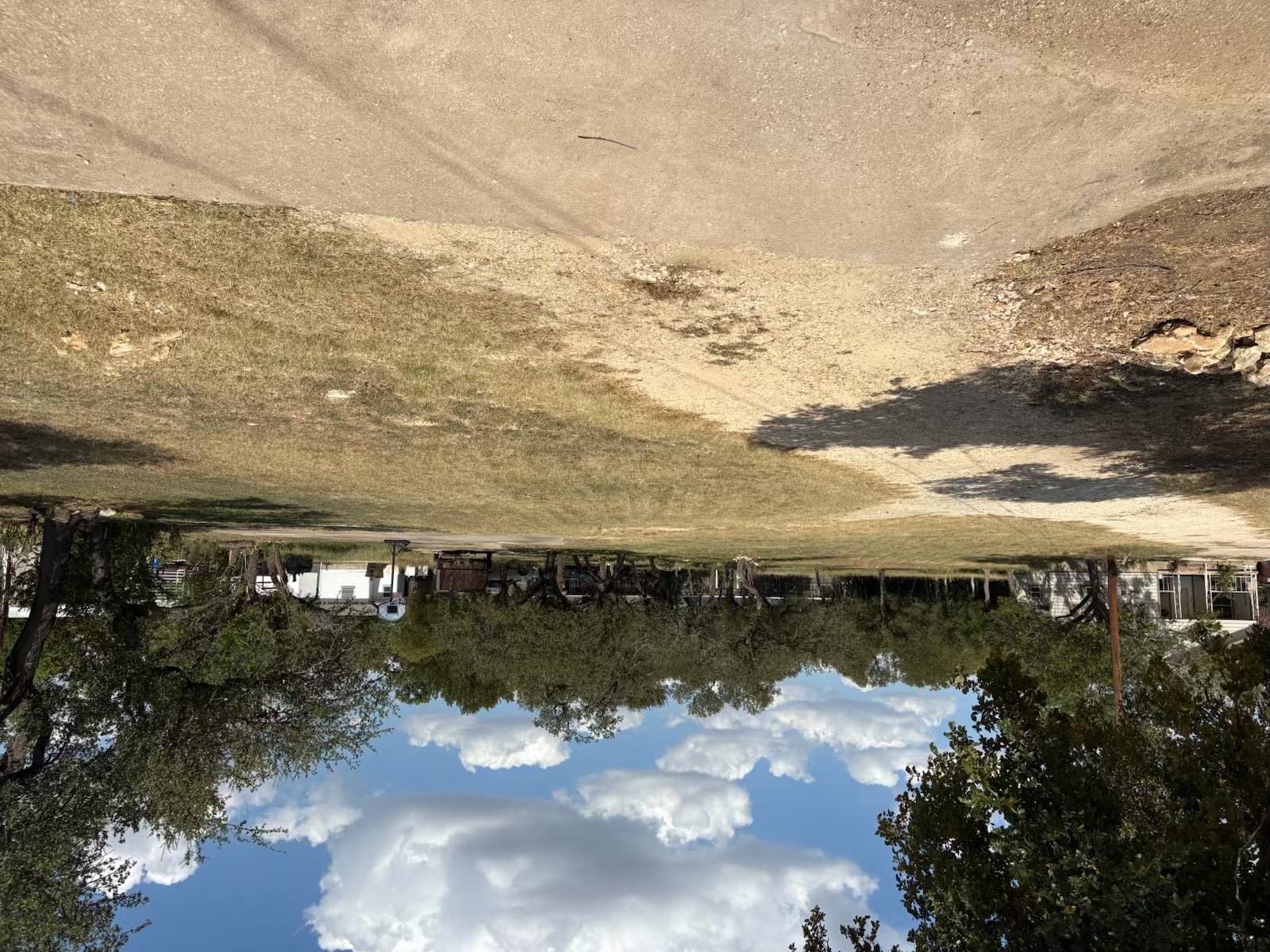 a view of outdoor space with swimming pool and green space