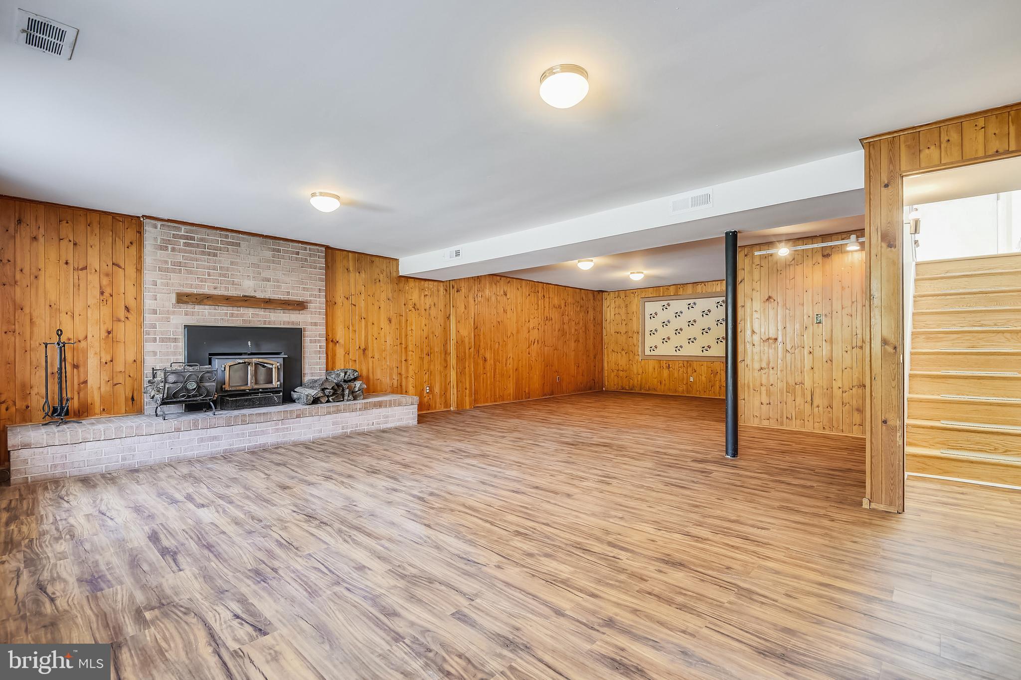 222 Rickswood Road Lutherville-Timonium, MD 21093 - Photo 19 of 34 Family Room with Wood burning FP