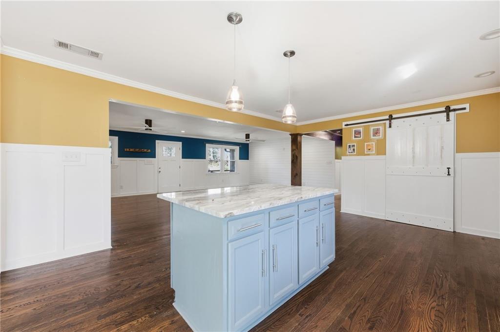 1532 Alverado Way Decatur, GA 30032 - Photo 11 of 41 a kitchen with a sink and wooden floor