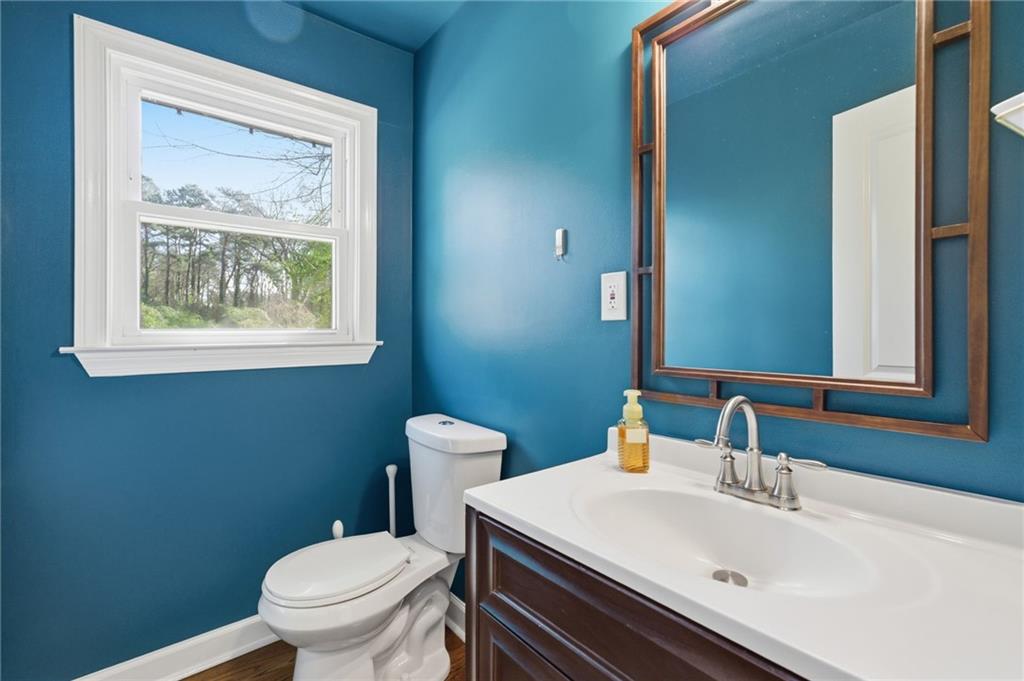 1532 Alverado Way Decatur, GA 30032 - Photo 17 of 41 a bathroom with a sink mirror and toilet