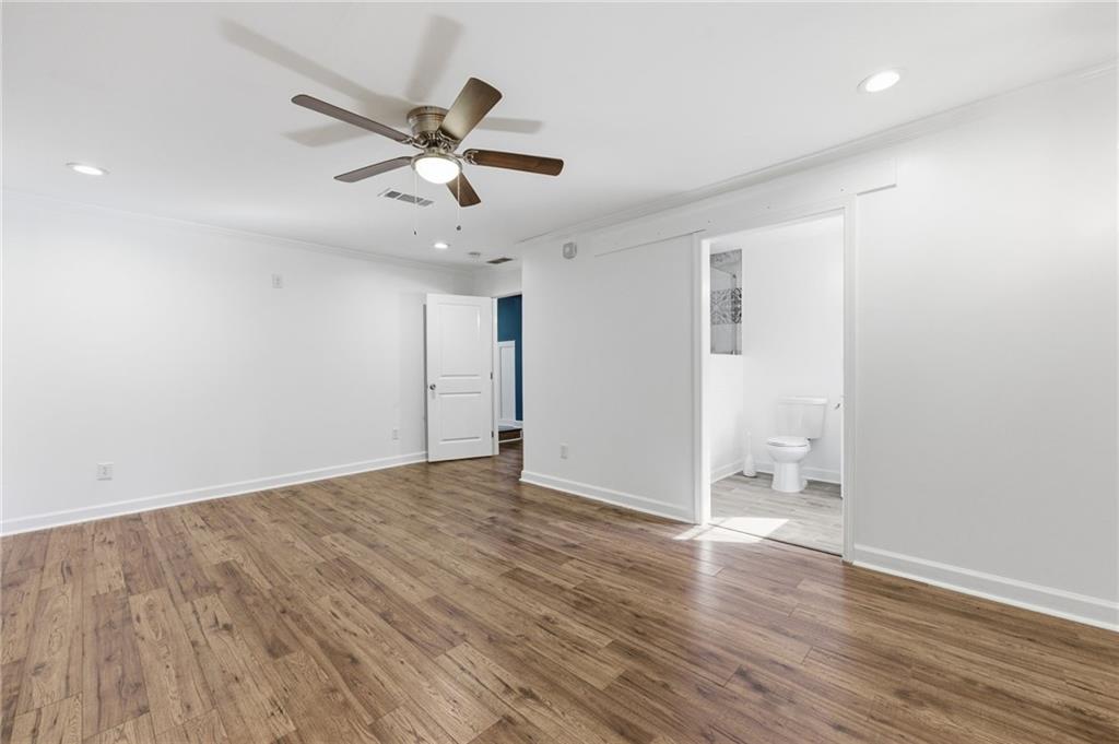 1532 Alverado Way Decatur, GA 30032 - Photo 21 of 41 wooden floor in an empty room with a window
