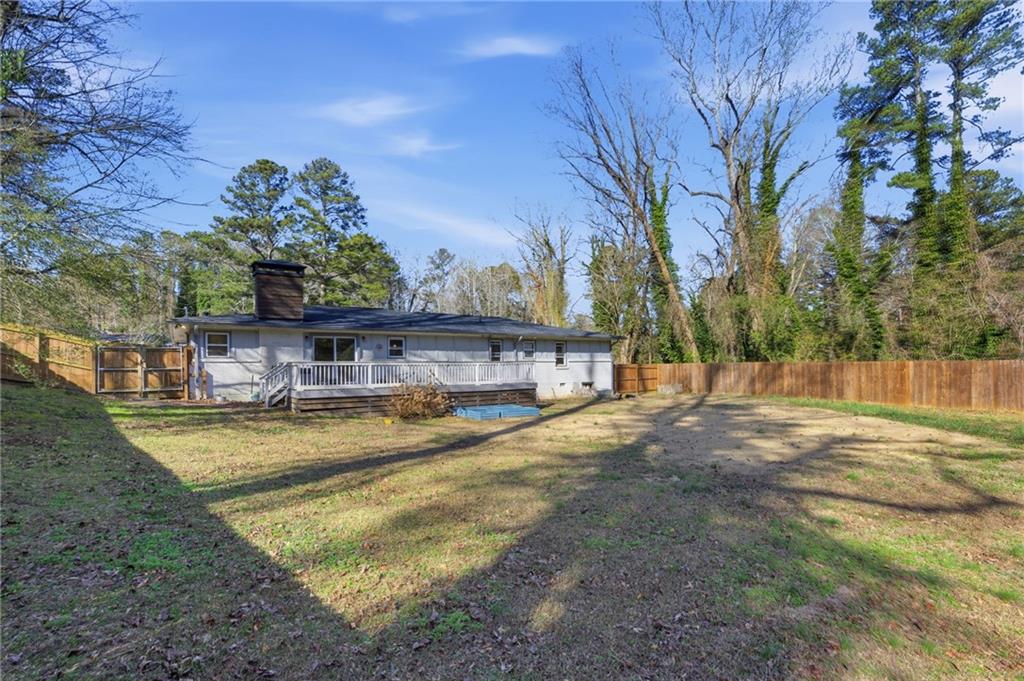 1532 Alverado Way Decatur, GA 30032 - Photo 31 of 41 a view of a swimming pool with an outdoor space and seating area