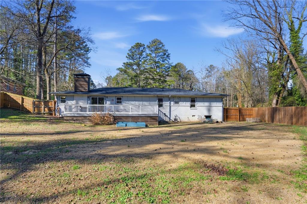1532 Alverado Way Decatur, GA 30032 - Photo 32 of 41 a view of a house with a yard and a large tree