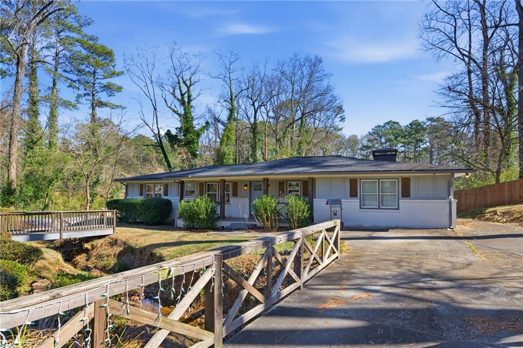 1532 Alverado Way Decatur, GA 30032 - Photo 35 of 41 a view of a deck with chairs and wooden fence