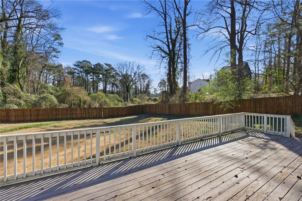 1532 Alverado Way Decatur, GA 30032 - Photo 38 of 41 a view of balcony with wooden floor and fence