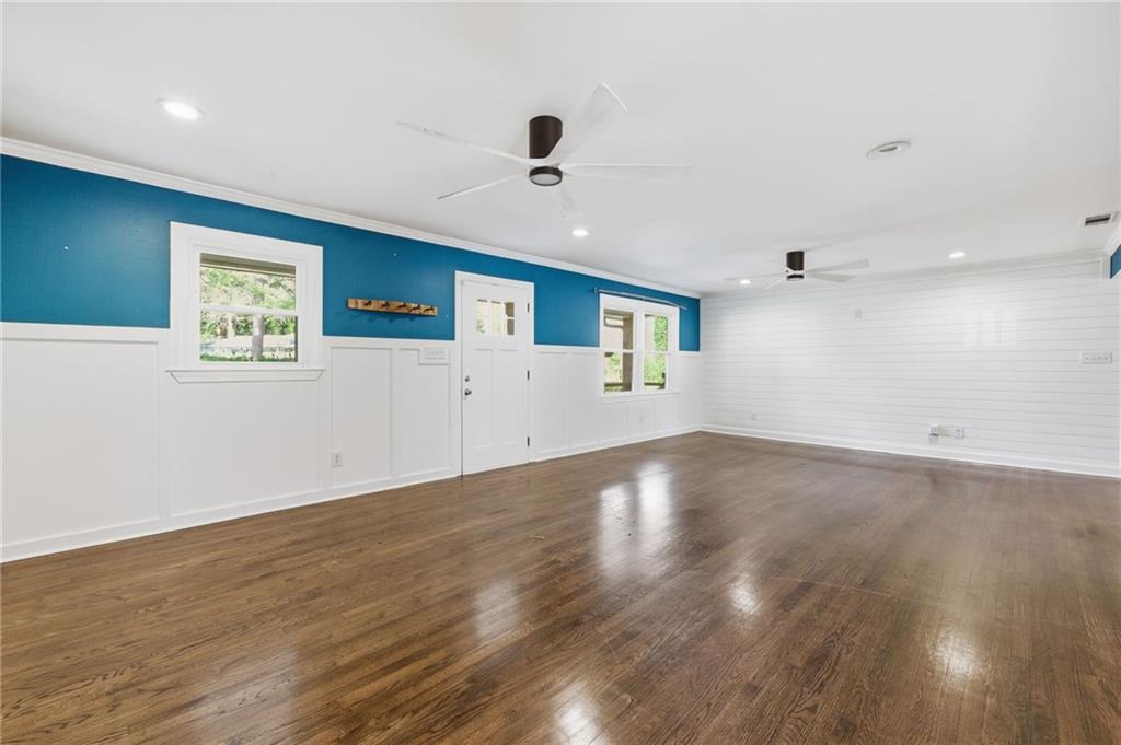 1532 Alverado Way Decatur, GA 30032 - Photo 5 of 41 an empty room with wooden floor and windows
