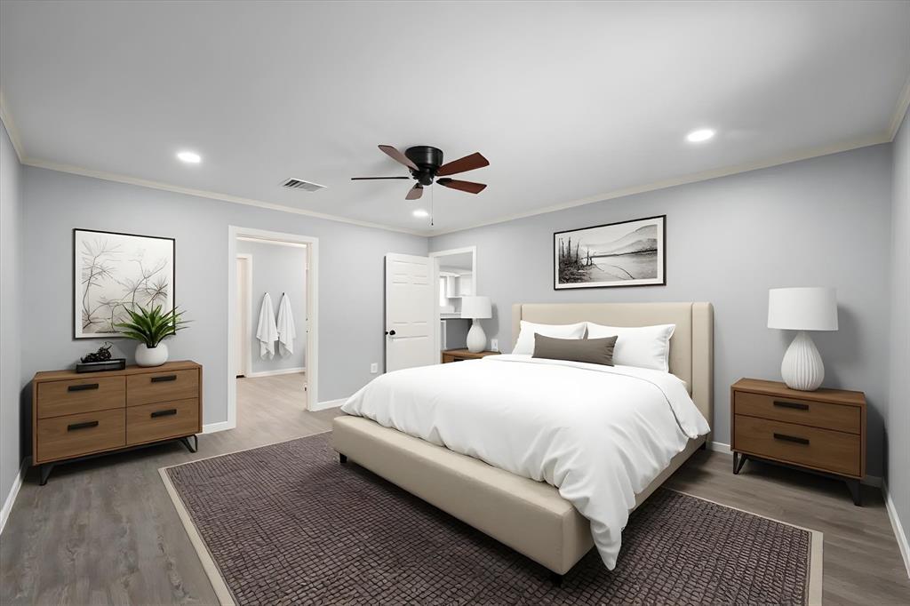 1009 North Spikes Road Corsicana, TX 75110 - Photo 6 of 31 a bedroom with a bed and ceiling fan