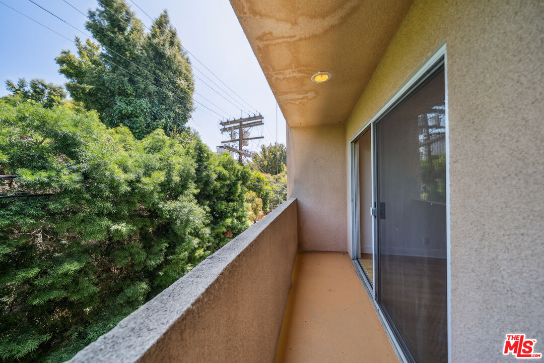1508 Greenfield Avenue, Unit 206 Los Angeles, CA 90025 - Photo 4 of 31 a view of balcony