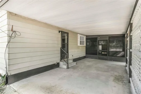 a view of front door with outdoor space