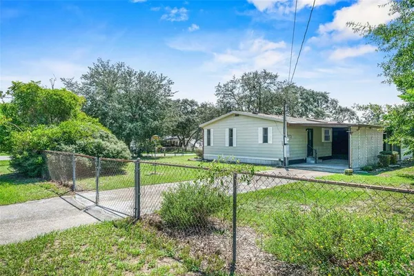 a view of an empty room with stairs