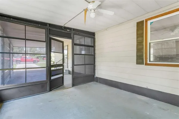 an aerial view of a house with a garden