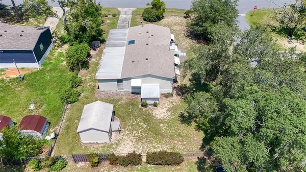 an aerial view of a house with a garden