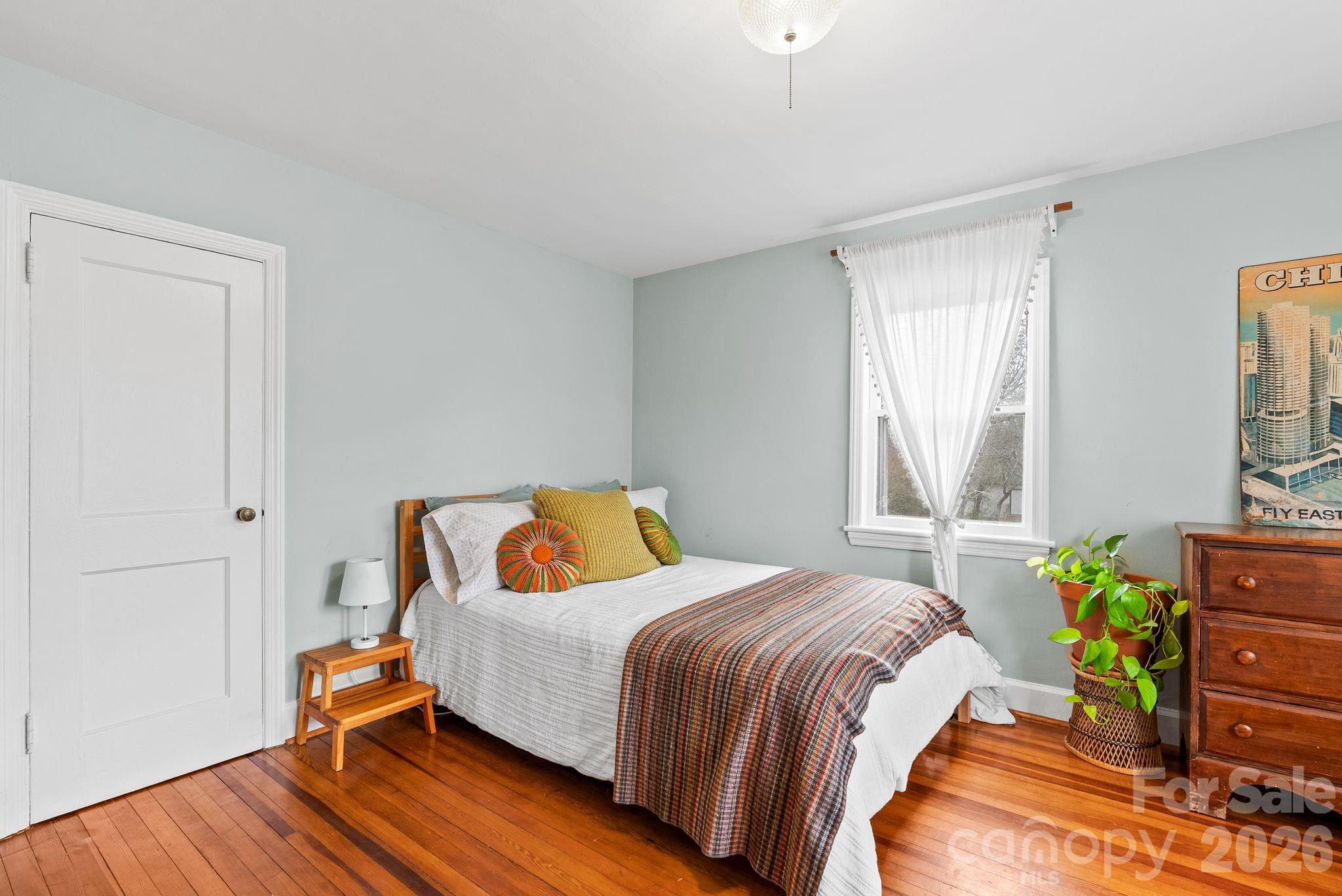 271 Pisgah View Road Asheville, NC 28806 - Photo 18 of 40 a bedroom with a bed and dresser