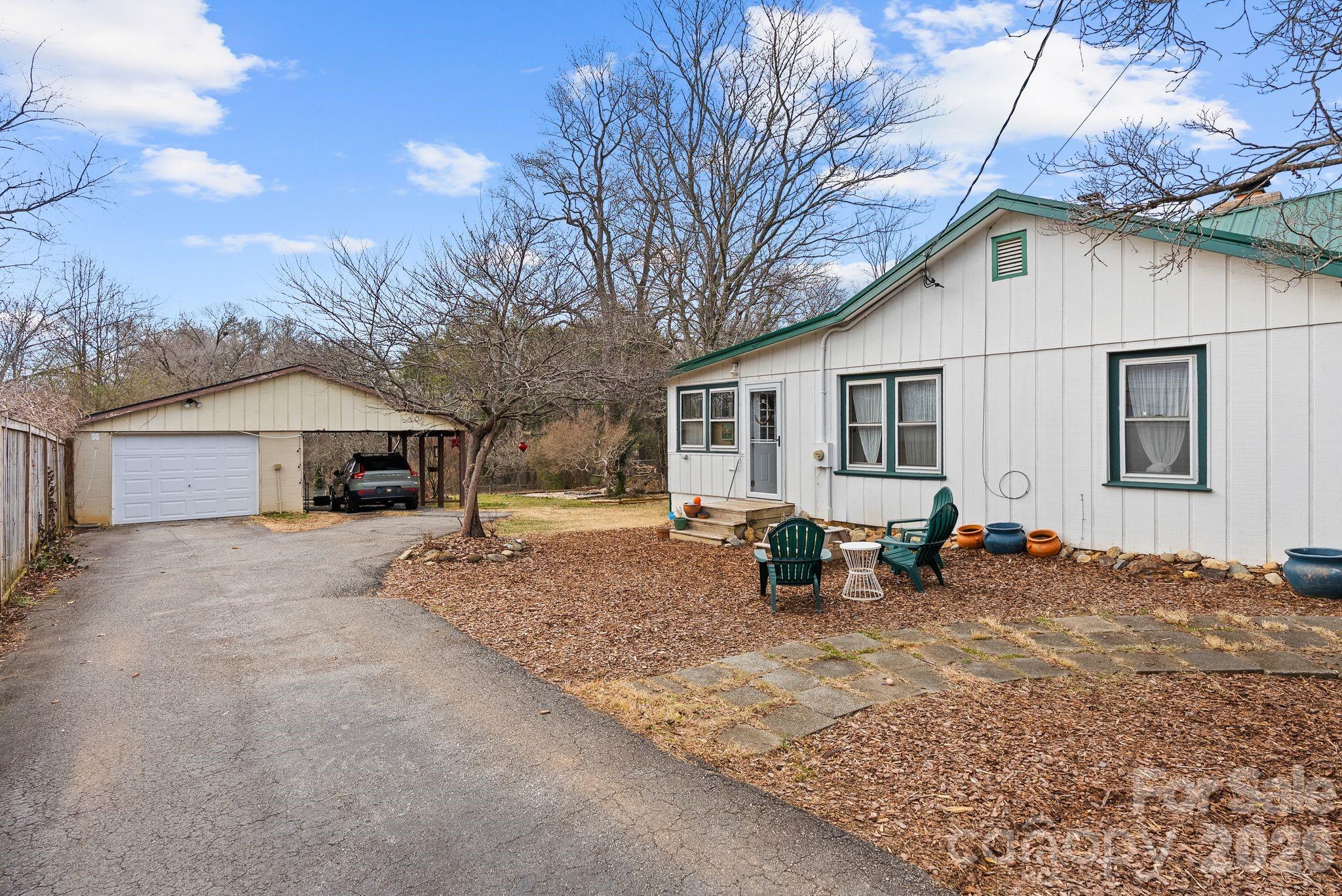 271 Pisgah View Road Asheville, NC 28806 - Photo 2 of 40 a view of a house with a patio