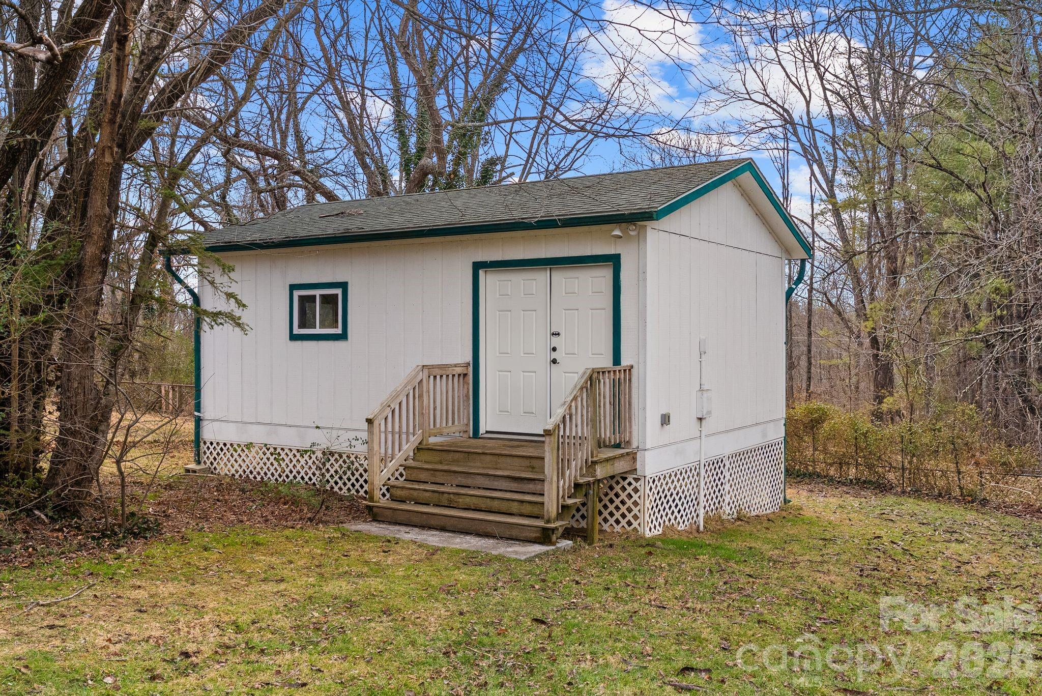 271 Pisgah View Road Asheville, NC 28806 - Photo 24 of 40 a view of a house with a yard