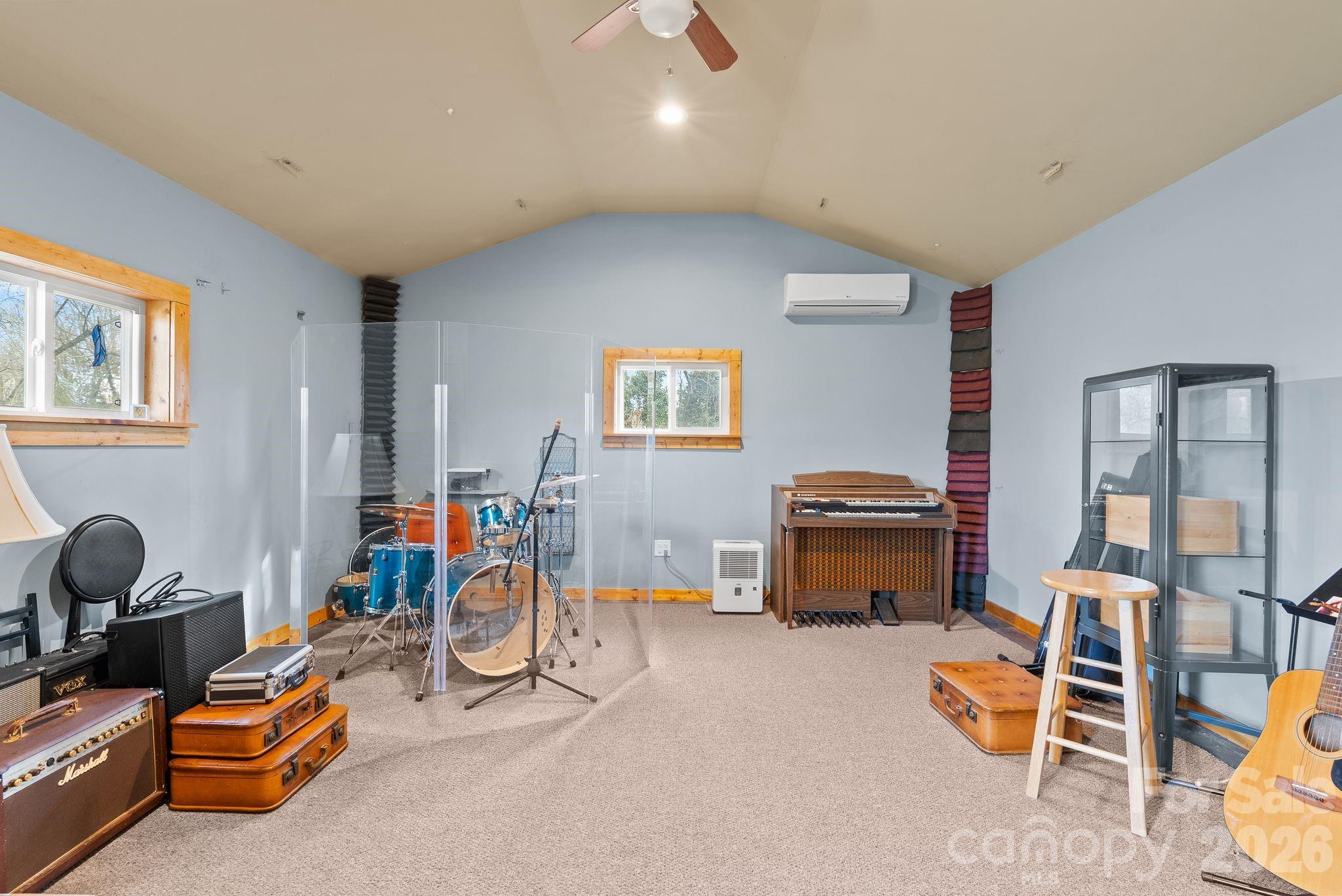 271 Pisgah View Road Asheville, NC 28806 - Photo 25 of 40 a living room with furniture a air conditioner vent and a window