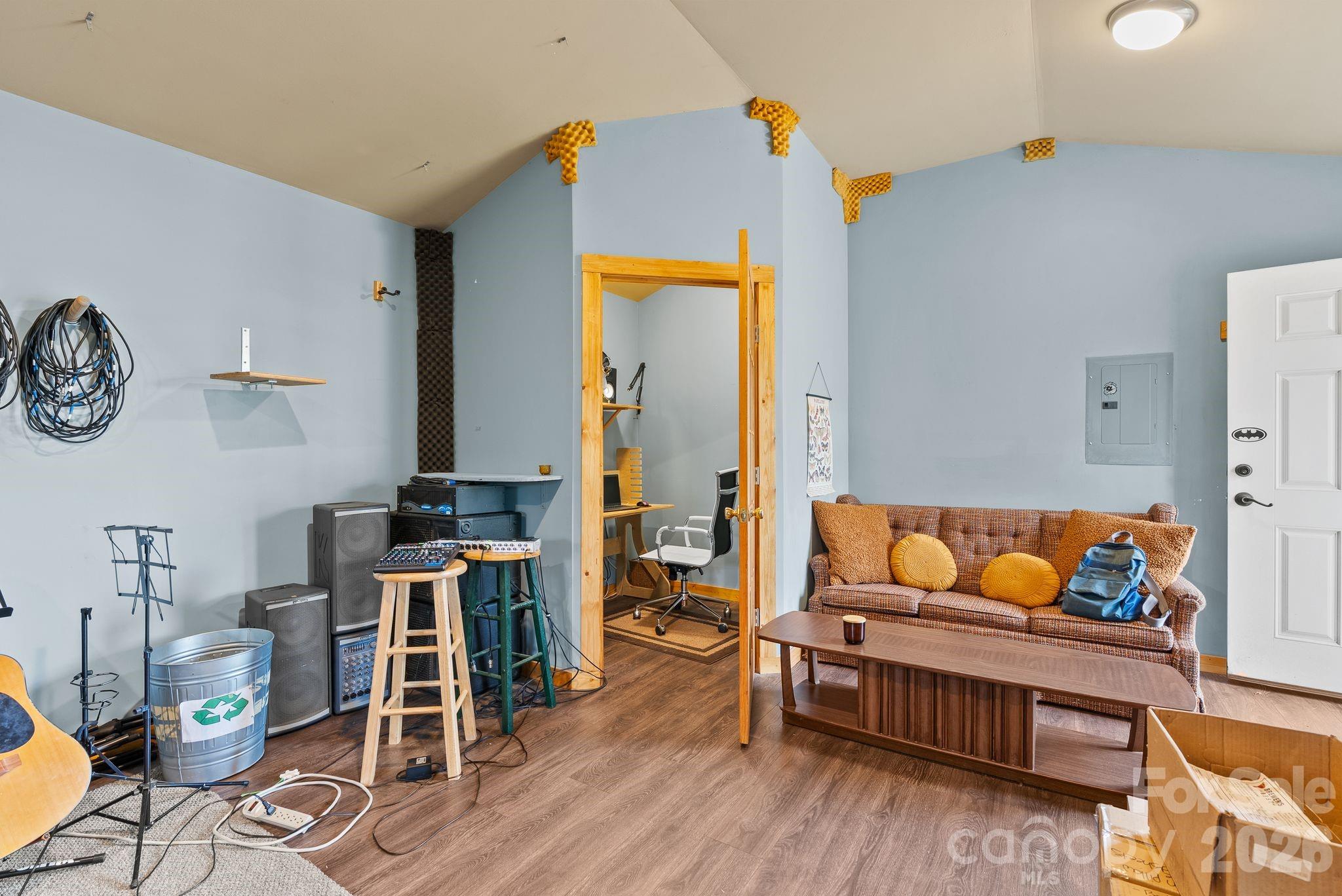 271 Pisgah View Road Asheville, NC 28806 - Photo 26 of 40 a living room with furniture and wooden floor