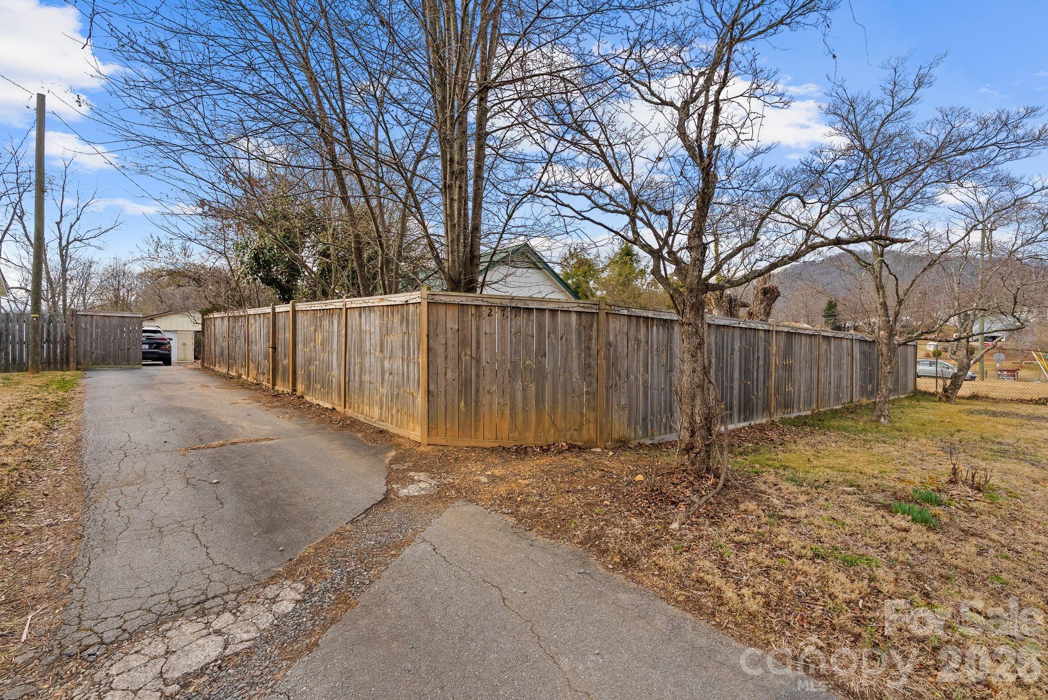 271 Pisgah View Road Asheville, NC 28806 - Photo 39 of 40 a view of backyard with wooden fence