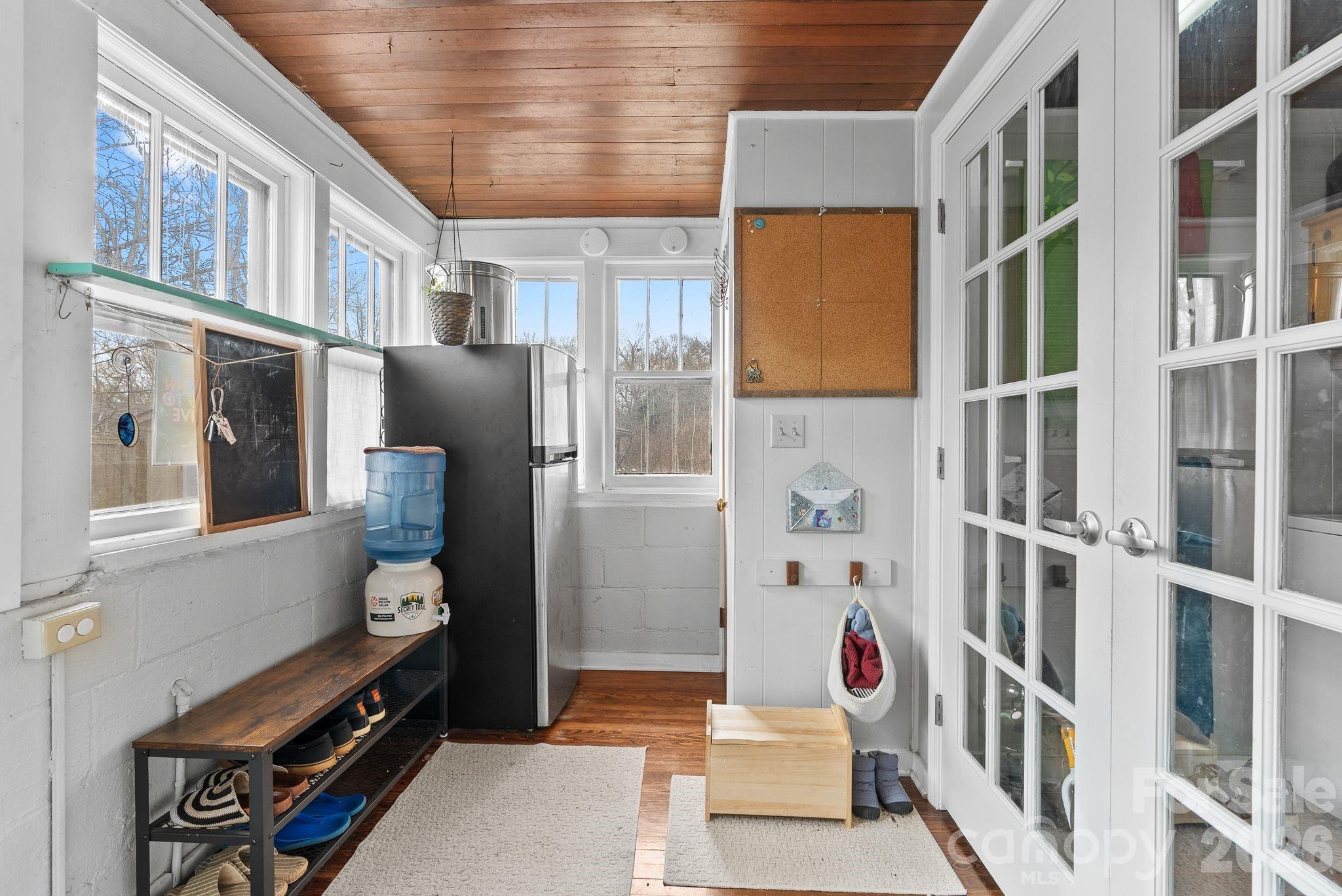 271 Pisgah View Road Asheville, NC 28806 - Photo 9 of 40 a view of an entryway with wooden floor and windows