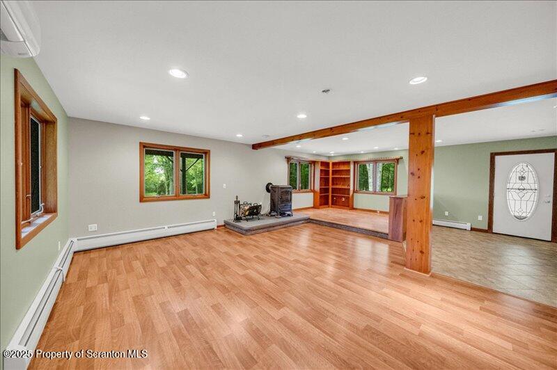 1777 Highway 2002 Nicholson, PA 18446 - Photo 17 of 52 a view of empty room with wooden floor and fan