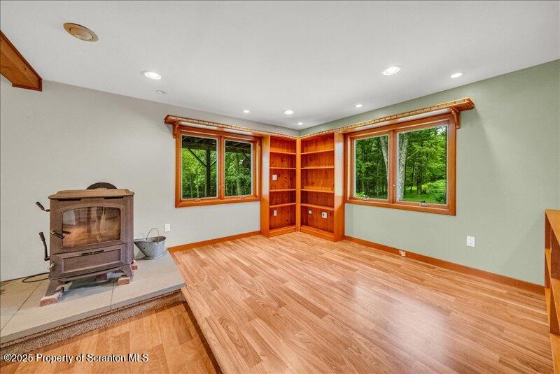 1777 Highway 2002 Nicholson, PA 18446 - Photo 19 of 52 a view of an empty room with a window and workspace