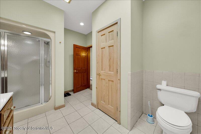 1777 Highway 2002 Nicholson, PA 18446 - Photo 28 of 52 a bathroom with a shower and a toilet