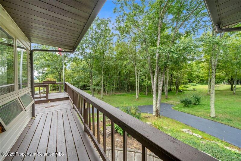 1777 Highway 2002 Nicholson, PA 18446 - Photo 34 of 52 a view of balcony with deck and wooden floor