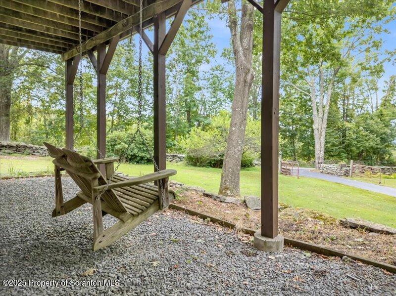 1777 Highway 2002 Nicholson, PA 18446 - Photo 39 of 52 a view of a two chair in the patio with a backyard