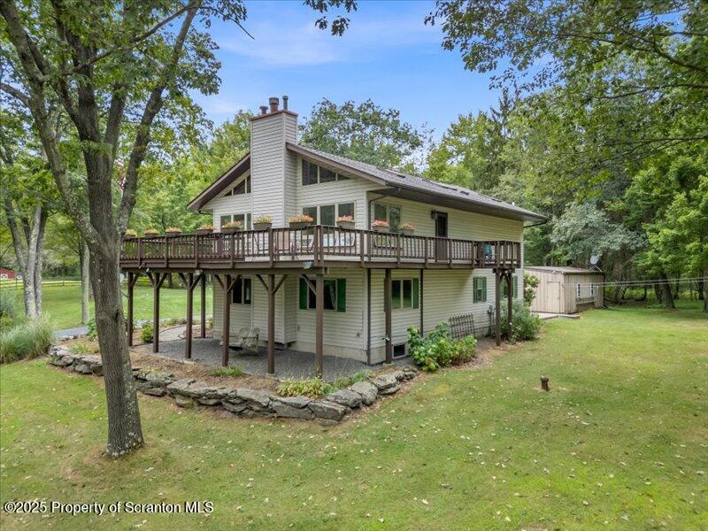 1777 Highway 2002 Nicholson, PA 18446 - Photo 40 of 52 a front view of a house with a garden