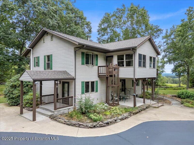 1777 Highway 2002 Nicholson, PA 18446 - Photo 46 of 52 a front view of a house with a porch