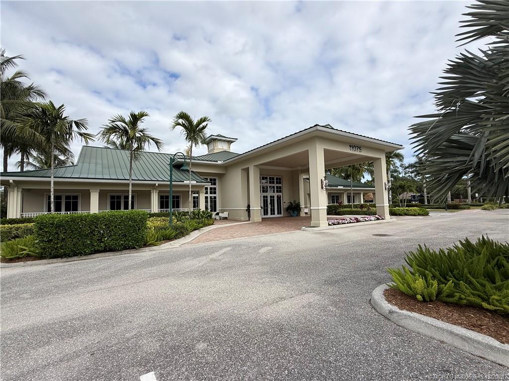 11075 West Indiantown Road, Unit 6 Jupiter, FL 33478 - Photo 12 of 14 a view of a building with a garden