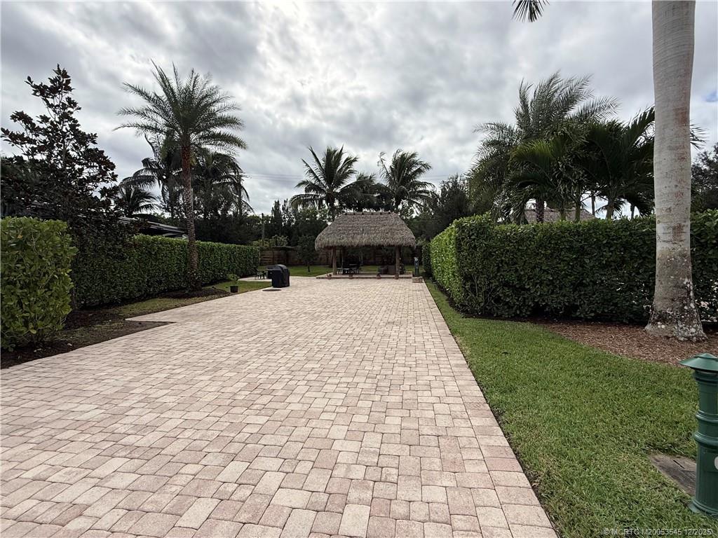 11075 West Indiantown Road, Unit 6 Jupiter, FL 33478 - Photo 2 of 14 a view of a backyard
