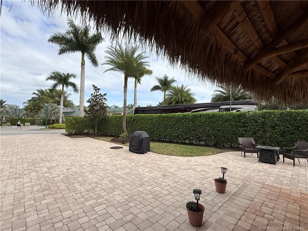 11075 West Indiantown Road, Unit 6 Jupiter, FL 33478 - Photo 3 of 14 a view of outdoor space yard and patio