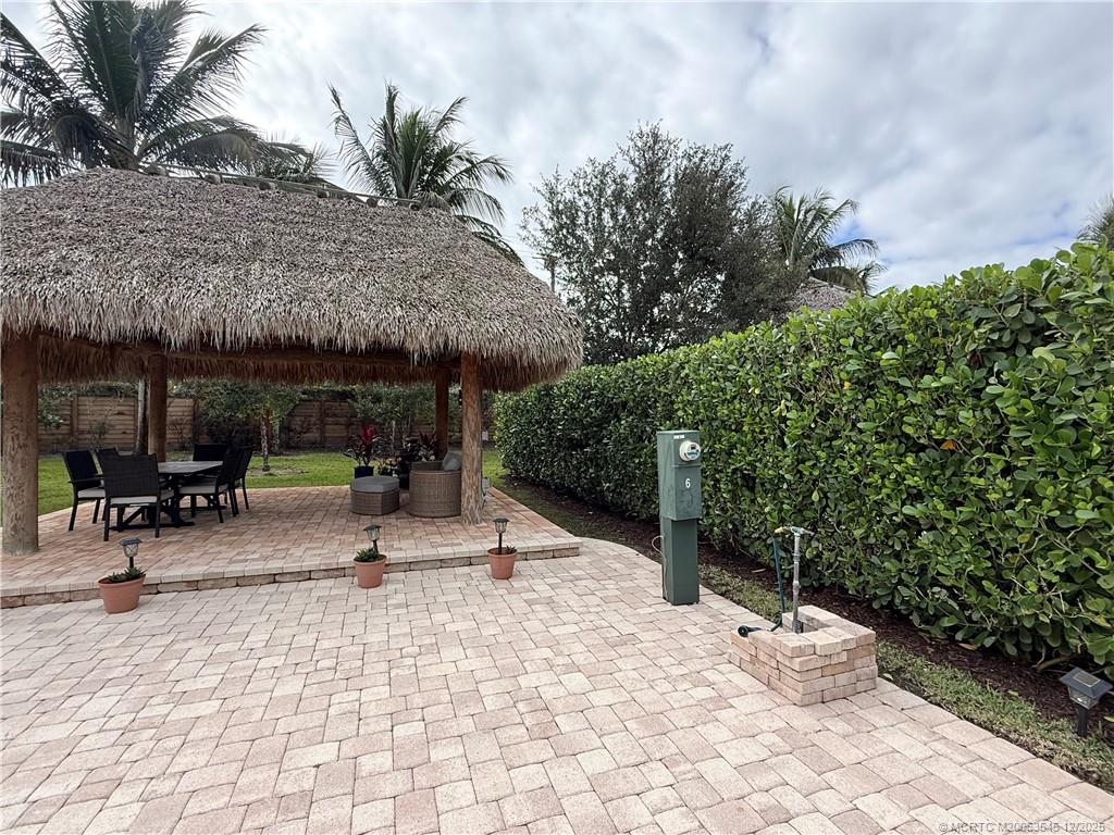 11075 West Indiantown Road, Unit 6 Jupiter, FL 33478 - Photo 4 of 14 a view of a patio with a patio