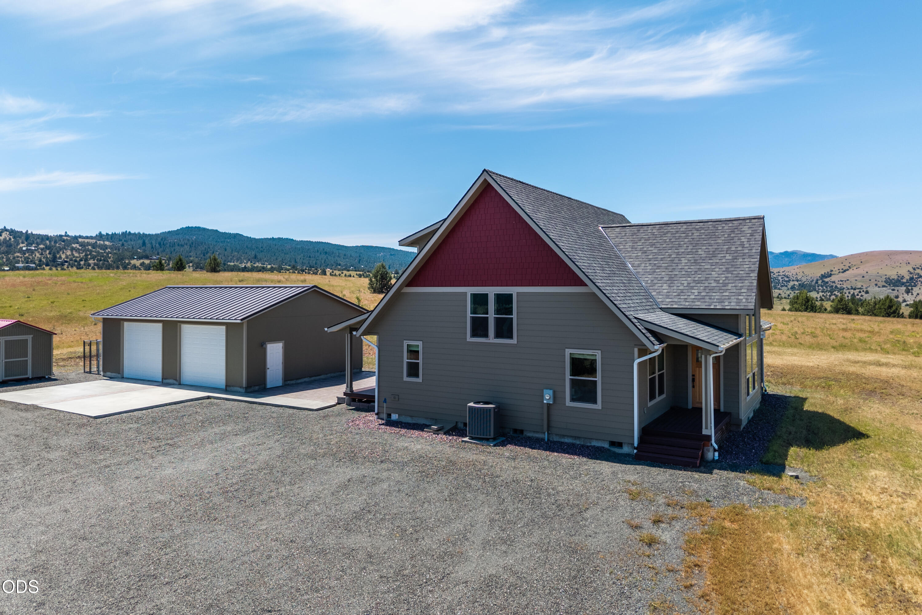 26216 West Bench Road John Day, OR 97845 - Photo 5 of 53 a view of a house with a yard