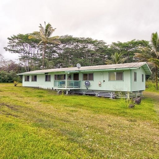 136 A Hoaka Road Hilo, HI 96720 - Photo 3 of 10 a view of a house with a swimming pool