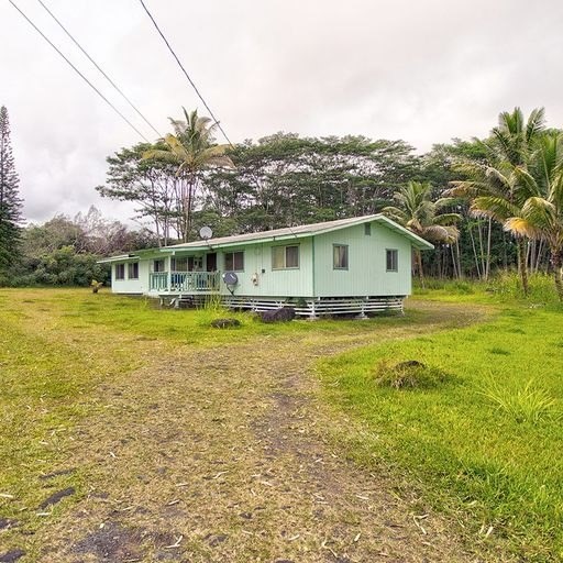 136 A Hoaka Road Hilo, HI 96720 - Photo 4 of 10 a view of a swimming pool with a lake view