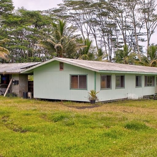 136 A Hoaka Road Hilo, HI 96720 - Photo 5 of 10 a view of a house with a yard