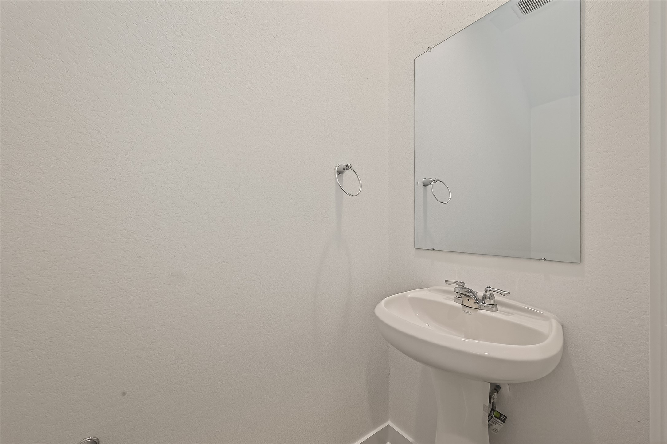 2826 Lisburn Ter Lane Houston, TX 77051 - Photo 7 of 18 a bathroom with a sink and a mirror