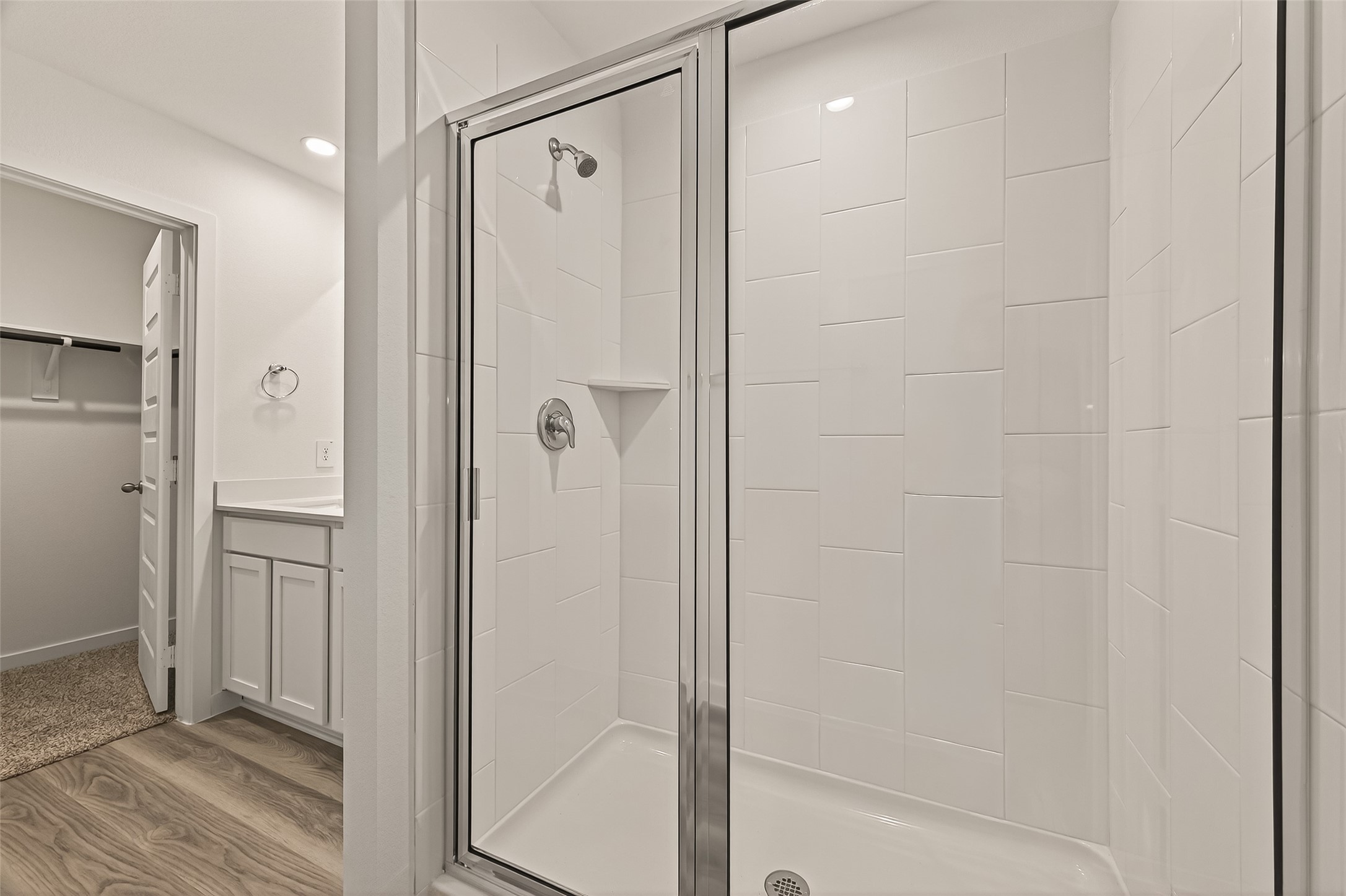 2826 Lisburn Ter Lane Houston, TX 77051 - Photo 9 of 18 a bathroom with a shower and a glass door