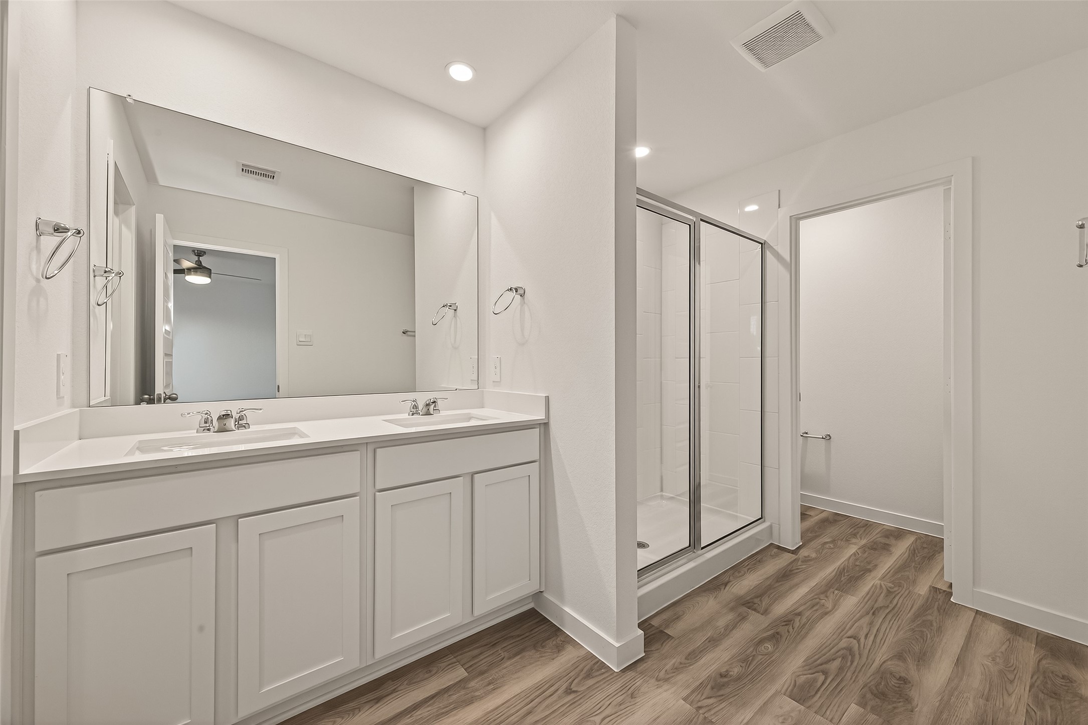 2826 Lisburn Ter Lane Houston, TX 77051 - Photo 10 of 18 a bathroom with a double vanity sink and mirror